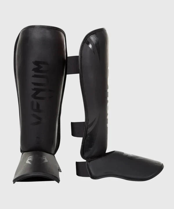 Venum Challenger Standup Shin Guards in combat sports setting