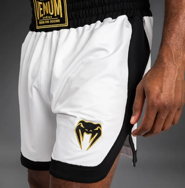 Venum Classic Boxing Shorts in red and black