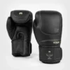 Venum Impact Evo Boxing Gloves in Action A pair of Venum Impact Evo Boxing Gloves