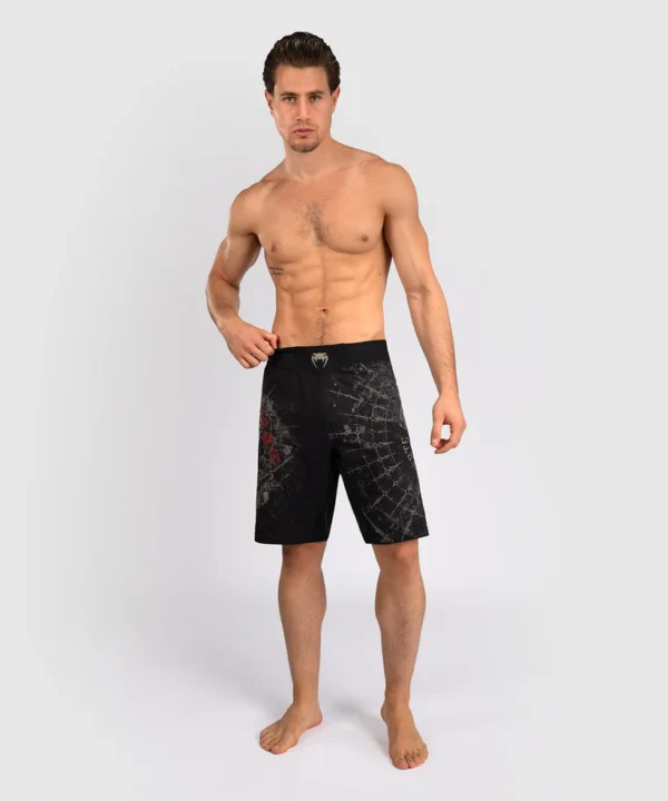 Venum Men's Fightshorts Santa Muerte 5.0 Man wearing Venum Santa Muerte 5.0 Men's Fightshorts