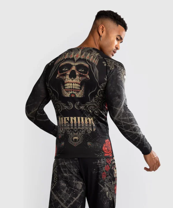Venum Santa Muerte 5.0 Men's Long Sleeve Rashguard in action.