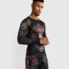 Man wearing Venum Santa Muerte 5.0 Men's Long Sleeve Rashguard