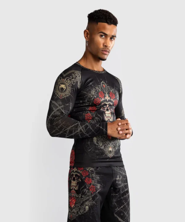 Man wearing Venum Santa Muerte 5.0 Men's Long Sleeve Rashguard