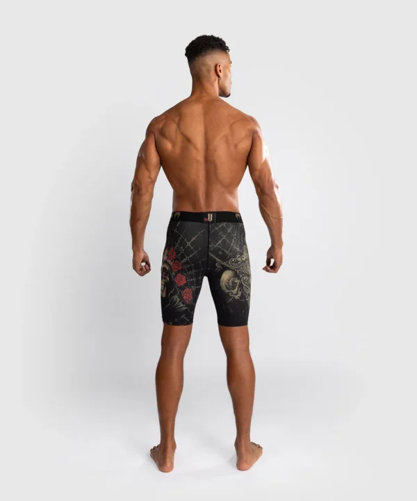 Man wearing Venum Santa Muerte 5.0 Men's Vale Tudo Shorts