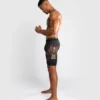 Venum Santa Muerte 5.0 Men's Vale Tudo Shorts on display