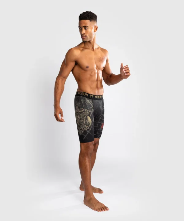 Man wearing Venum Santa Muerte 5.0 Vale Tudo Shorts