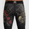 A man wearing Venum Santa Muerte 5.0 Vale Tudo Shorts