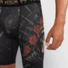 Man wearing Venum Santa Muerte 5.0 Men's Vale Tudo Shorts