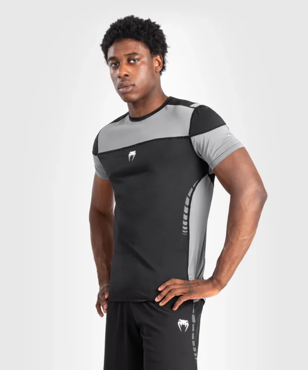 Man wearing Venum Tempest Men's Dry-Tech T-Shirt