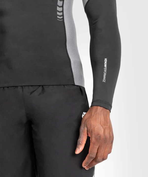 Man wearing Venum Tempest Long Sleeve Rashguard