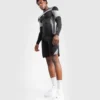 Man posing in Venum Tempest Long Sleeve Rashguard