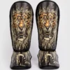 A pair of Venum Kids Tiger Shin Guards