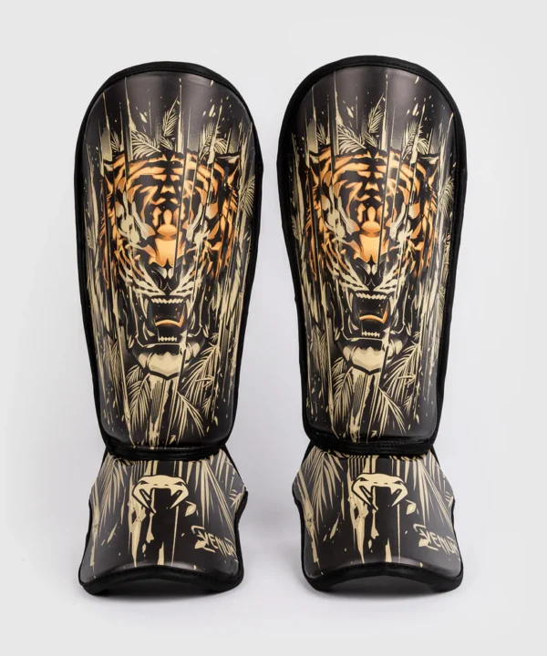 A pair of Venum Kids Tiger Shin Guards