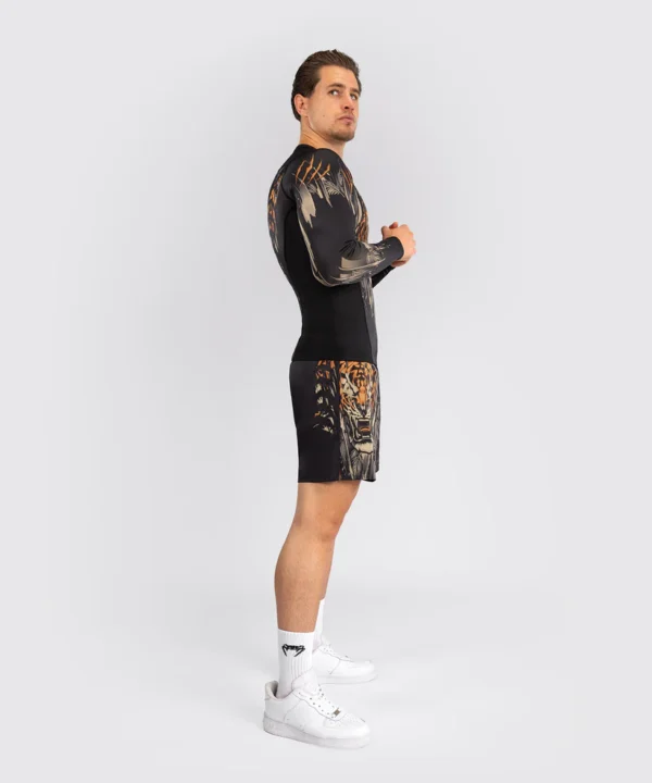 Venum Tiger Rashguard Outfit for Men Man wearing Venum Tiger Men's Long Sleeve Rashguard