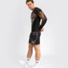 Venum Tiger Men's Rashguard Apparel Man wearing a Venum Tiger Men's Long Sleeve Rashguard