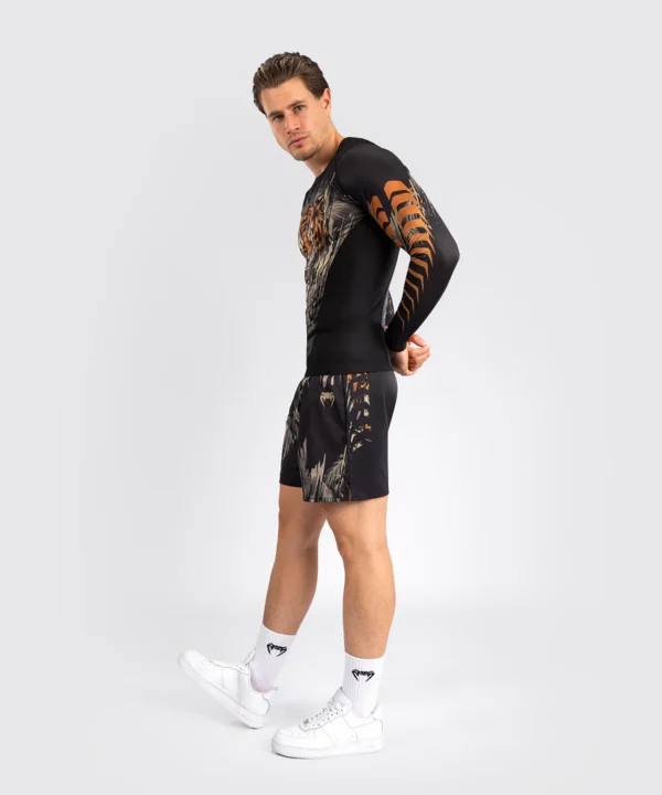 Venum Tiger Men's Rashguard Apparel Man wearing a Venum Tiger Men's Long Sleeve Rashguard