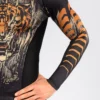 Venum Tiger Men's Rashguard Man wearing Venum Tiger Men's Long Sleeve Rashguard