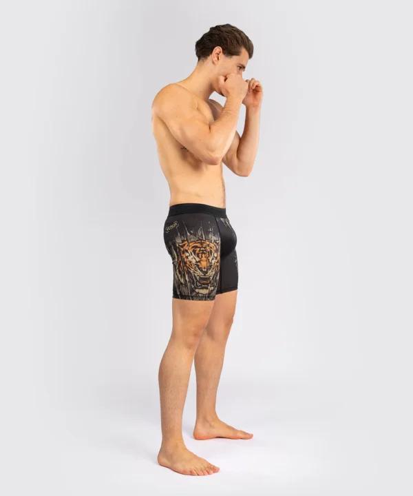 Venum Tiger Men's Vale Tudo Shorts Outfit Man wearing Venum Tiger Men's Vale Tudo Shorts