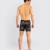 Venum Tiger Men's Vale Tudo Shorts by Venum Man modelling Venum Tiger Men's Vale Tudo Shorts