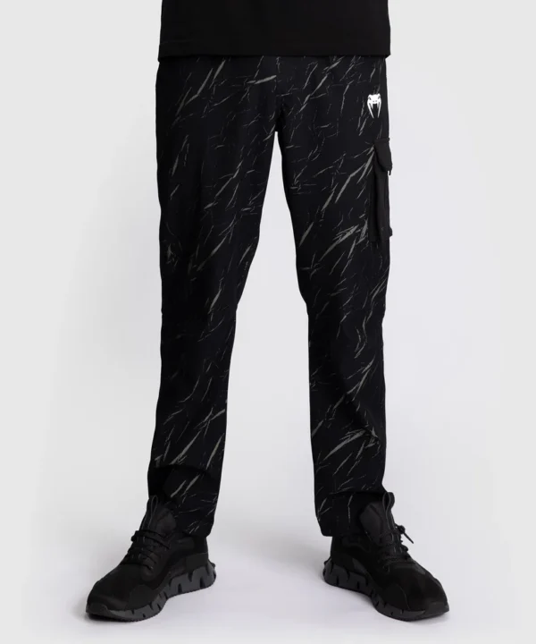 Venum Trooper Men's Tracksuit Bottoms. Venum Trooper men's tracksuit bottoms pants in a lifestyle setting.