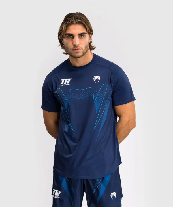 Man wearing Venum x Top Rank Original Men's Dry-Tech T-Shirt.