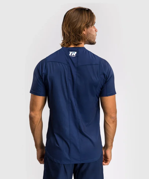 Man wearing Venum x Top Rank Original Men's Dry-Tech T-shirt