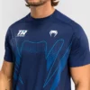 Man wearing a Venum x Top Rank Original Men's Dry-Tech T-shirt