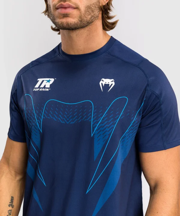 Man wearing a Venum x Top Rank Original Men's Dry-Tech T-shirt