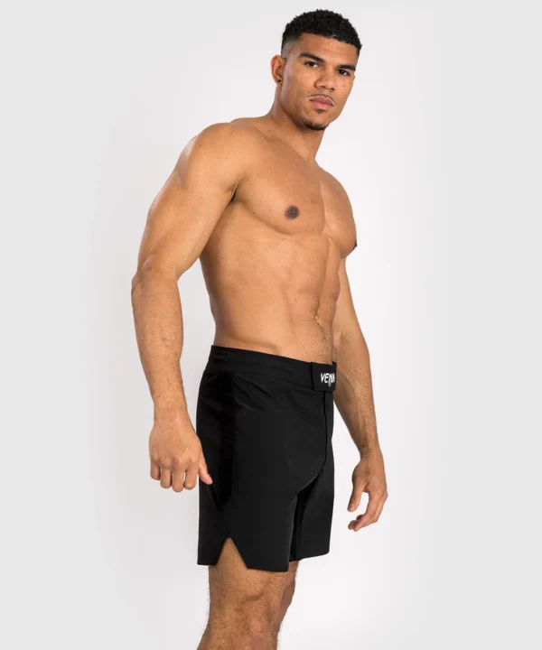 Venum Contender Men's Fight Shorts in action.