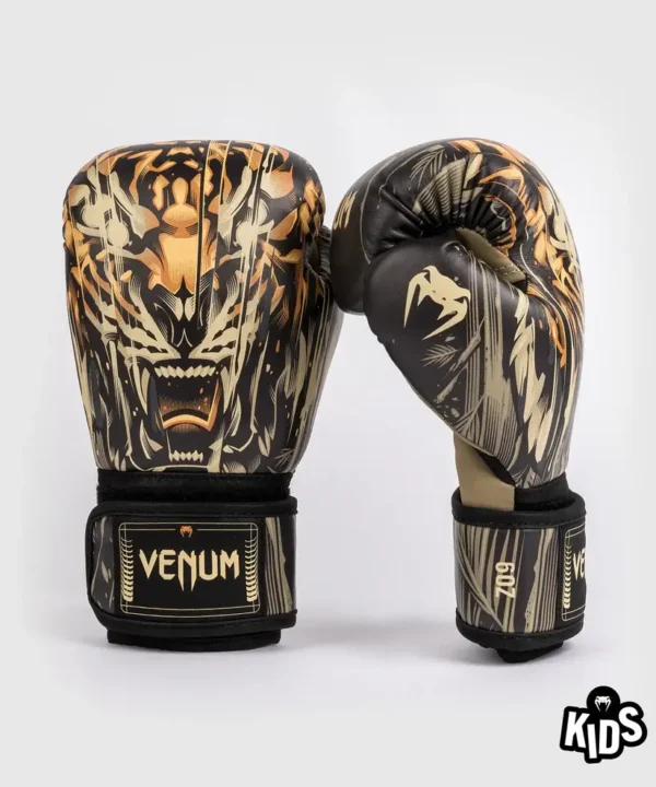 Kid wearing Venum Kids Tiger Boxing Gloves