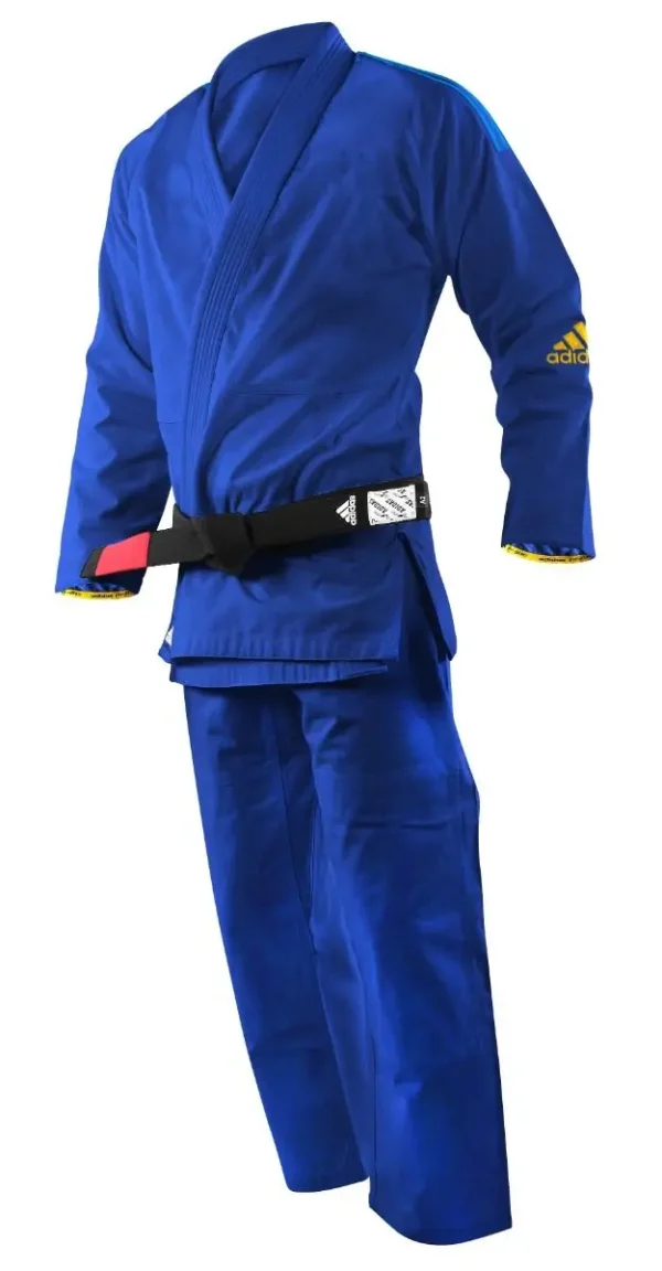 Adidas Kids BJJ Gi Response 265g Uniform. A child modeling the Adidas Kids BJJ Gi Response 265g Uniform.
