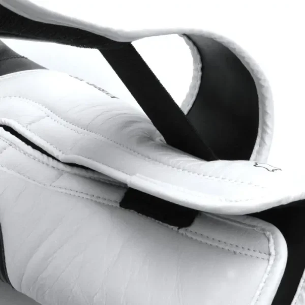 Pair of Adidas Hybrid 300 Pro Boxing Gloves in professional setting