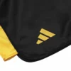 Man wearing Adidas Premium Satin Boxing Shorts