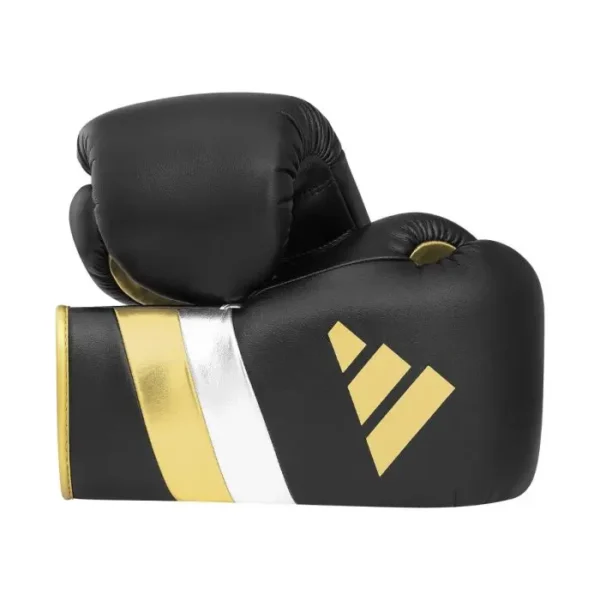 Adidas AdiSpeed Lace-Up Pro Boxing Gloves in action.