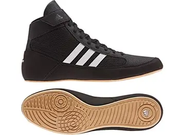 Grey Adidas Havoc wrestling boots with white stripes.