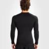 Man Wearing Venum Contender Long Sleeve Rash Guard Venum Contender Long Sleeve Men's Rash Guard in action