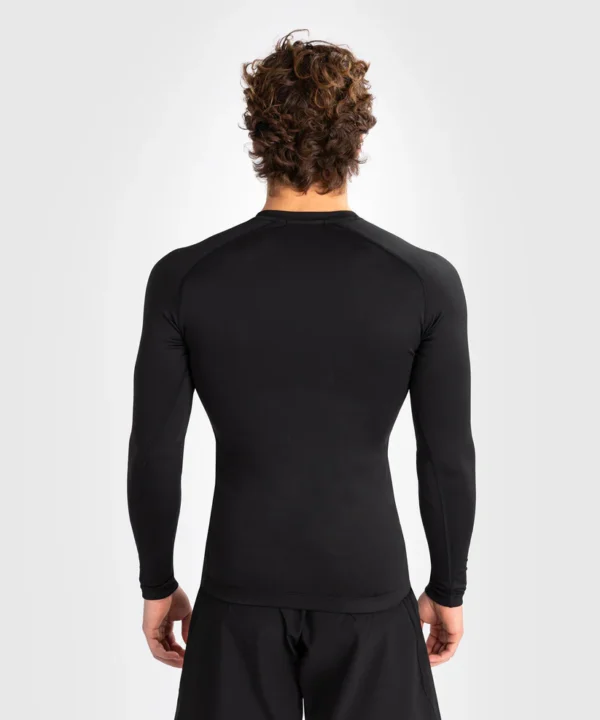 Man Wearing Venum Contender Long Sleeve Rash Guard Venum Contender Long Sleeve Men's Rash Guard in action