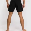 Man wearing Venum Contender Men's Fight Shorts