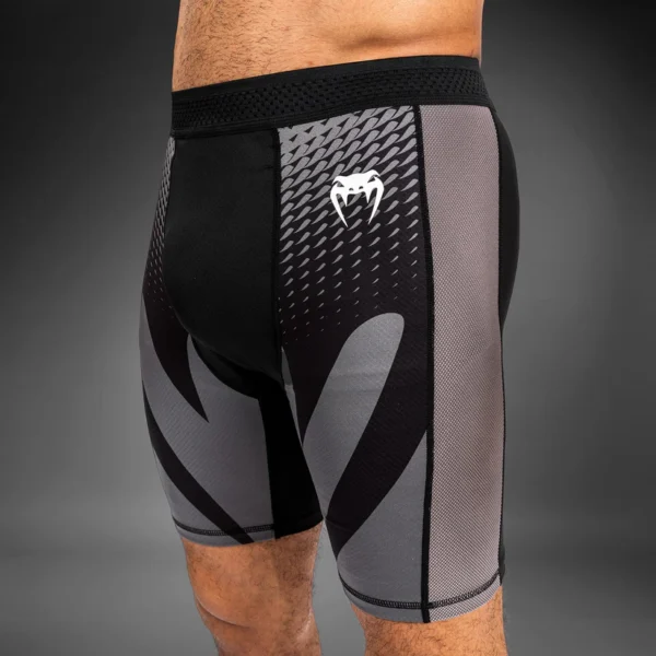Man wearing Venum Attack Men's Vale Tudo Shorts