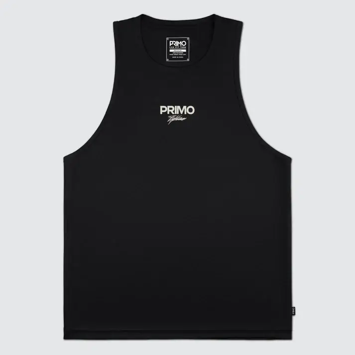Man wearing the Primo Kin Tank Top in a gym setting