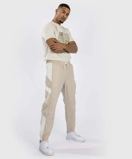 Venum Attack 90 tracksuit pants shown against a neutral background