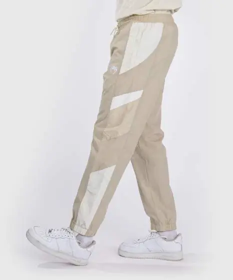 Venum Attack 90 tracksuit pants in dark color.