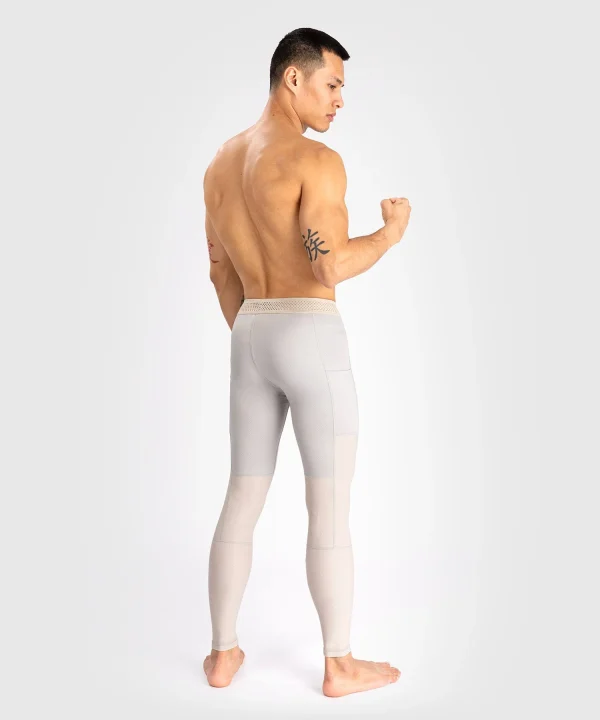 Venum Attack Mens Spats Compression Tights Sand 4 Man wearing Venum Attack Men's Spats Compression Tights