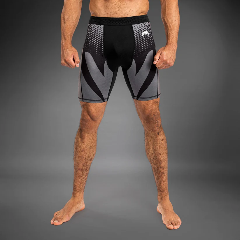 Man wearing Venum Attack Men's Vale Tudo Shorts