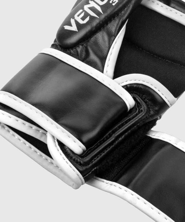 Black and white Venum Challenger 3.0 MMA sparring gloves