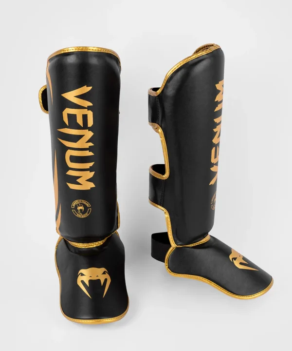 Venum Challenger Standup Shin Guards in red and black color scheme