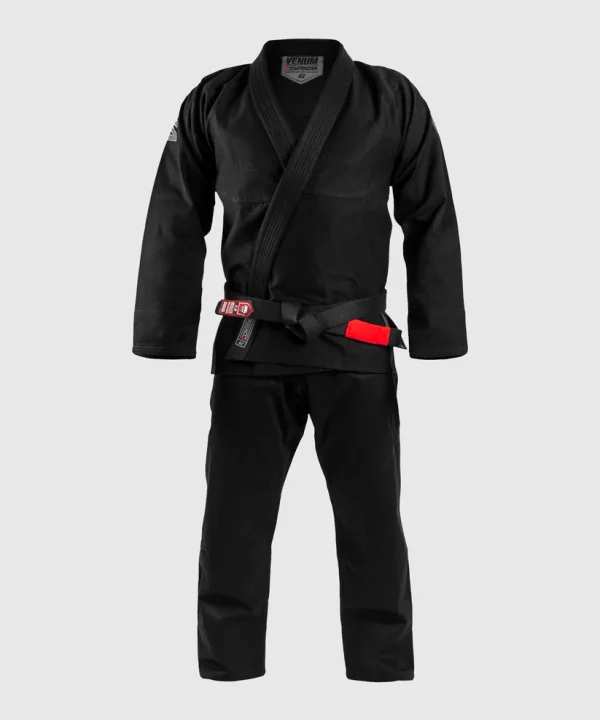 Venum Contender Evo Bjj Gi Black 1 Venum Contender Evo BJJ Gi in black on grey background