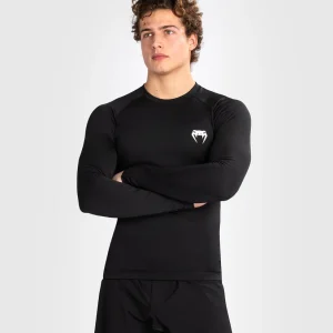 Man wearing Venum Contender long sleeve rash guard