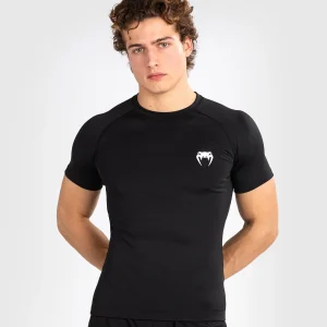 Man wearing Venum Contender Short Sleeve Men's Rash Guard