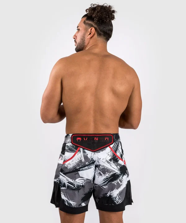 Venum Electron 3.0 Fight Shorts in blue and black design.